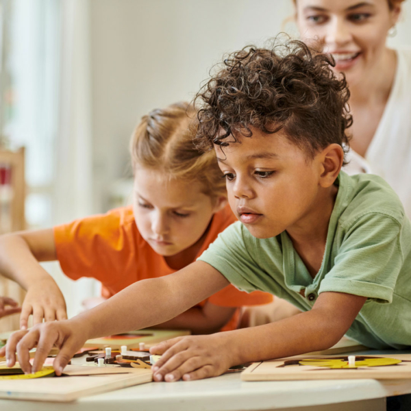 Kids playing at school in the classroom
